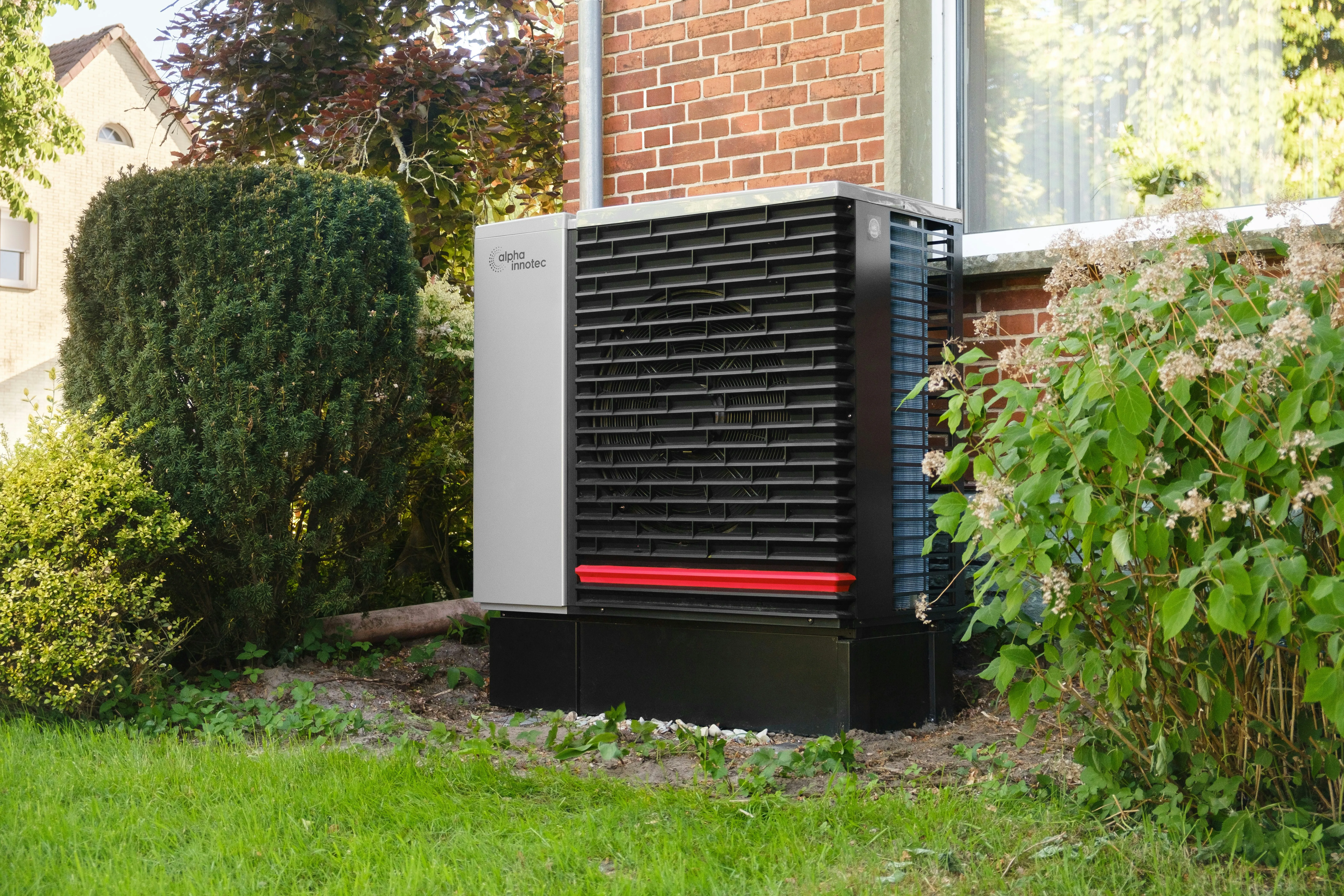 Air source heat pump outdoor unit — heat pumps continue to extract heat from outside air well below freezing